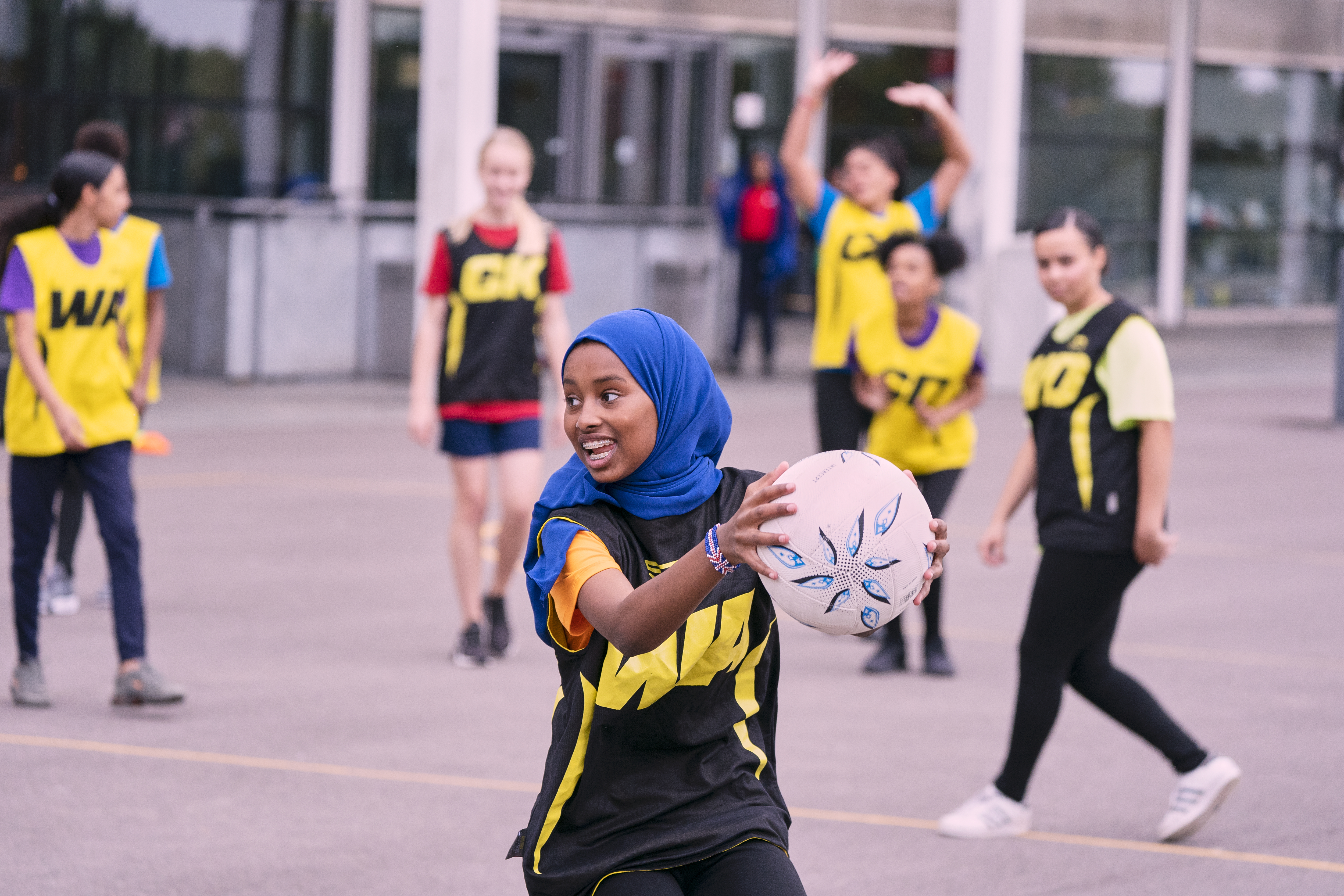 Girl playing netball